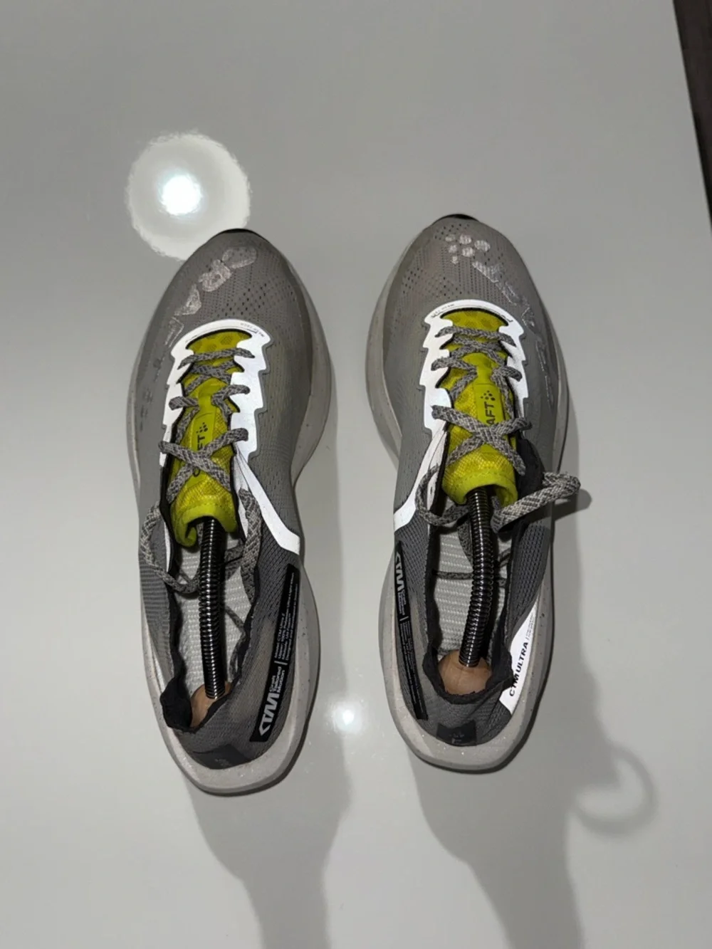 Craft Lightweight Neutral Gray Running Shoes with Bright Yellow Accents